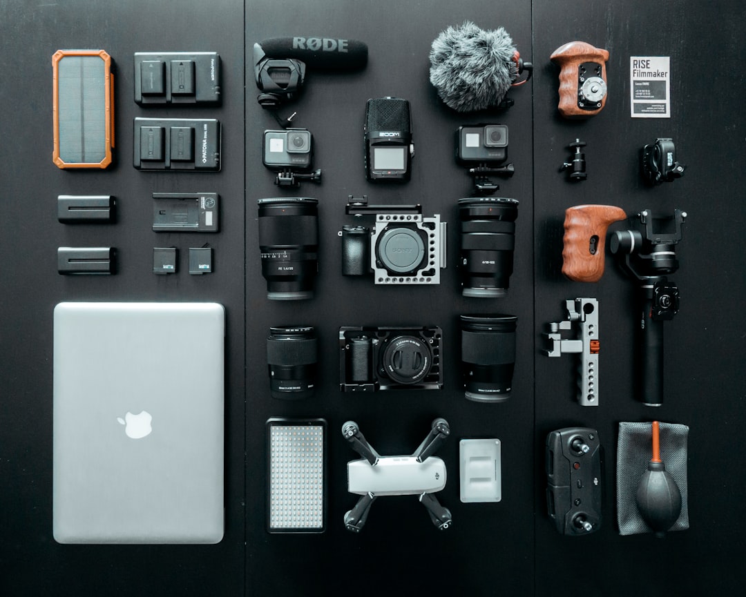 Photographer using different lenses